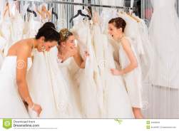 women-having-fun-bridal-dress-fitting-shop-gown-wedding-fashion-store-40408535